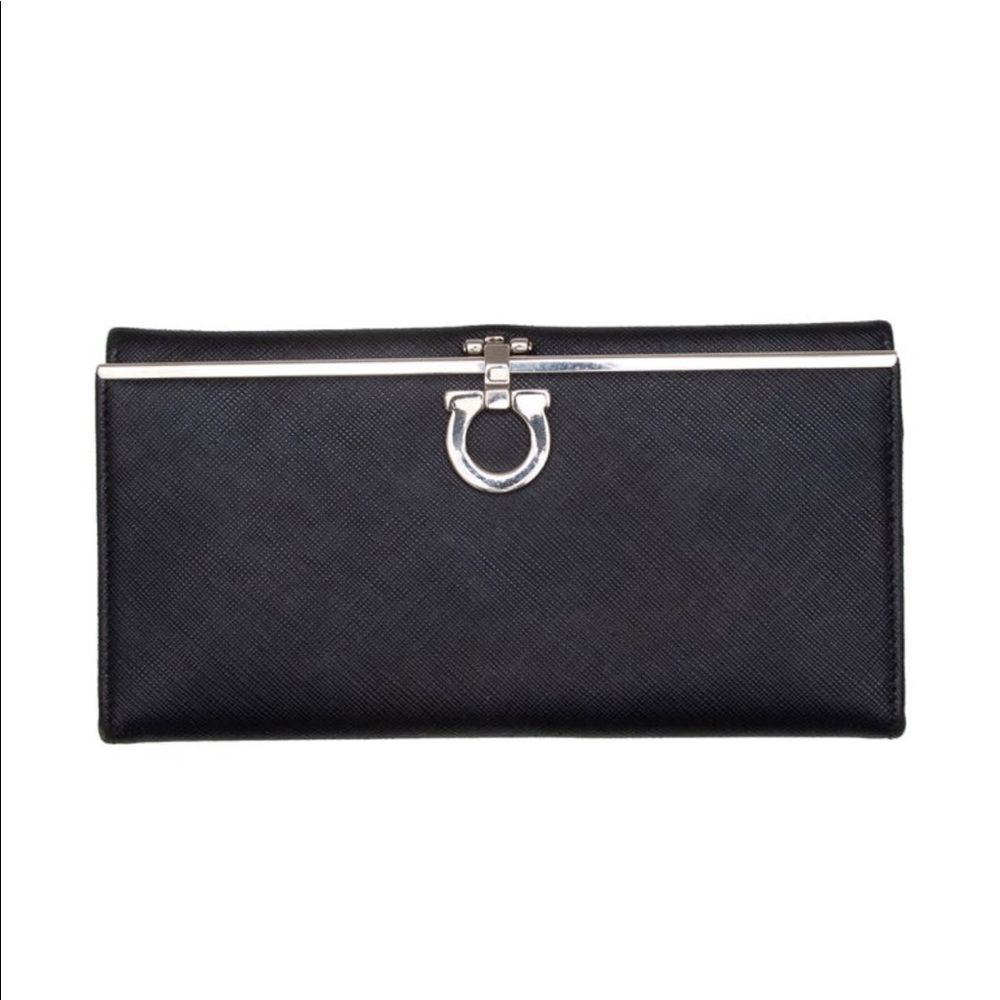 Salvatore Ferragamo 
Black Leather